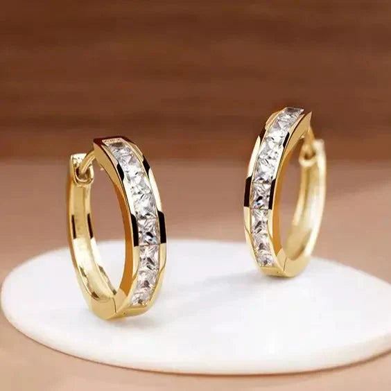 1+1 Offer: Elegant Gold and Crystal Earrings + Elegant bracelet with zirconias in gold
